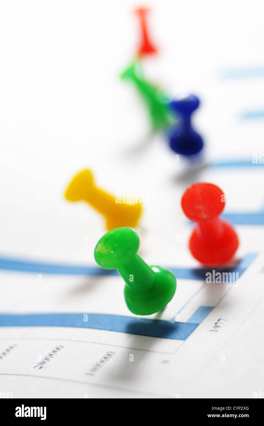 pin and business chart showing financial growth Stock Photo Alamy