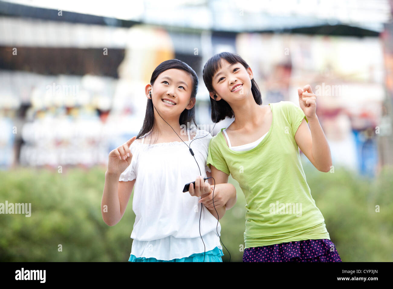Two schoolgirls holding hands hi-res stock photography and images - Alamy