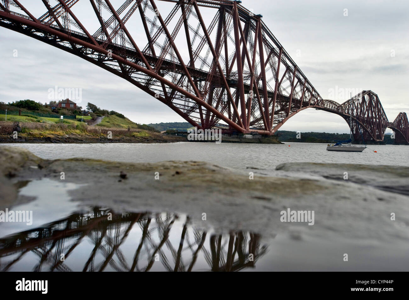 The Forth Bridge Reflected In A Puddle On The North Queensferry Shore 