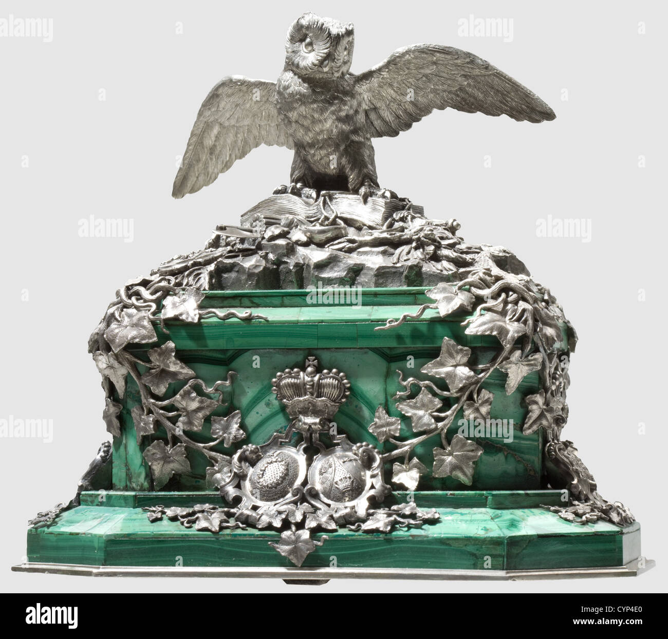 Karl Philipp Fürst von Wrede(1767 - 1838)- a gift of honour,Table centrepiece,massive,oblong rectangular,tiered malachite base with slate core and bevelled corners,20 x 15 cm,height of the base ca. 9 cm. The base entwined by ivy foliage,surmounted by an owl perched on a book decorated with symbols of justice,scales,sword,and fasces(referring to Wrede's former law studies)as well as a coat of arms,probably the primary of a 'Reichsfreiherr'(Reich Baron). The front with the ducal coat of arms of Wrede and his wife,on either side combined coat of a,Additional-Rights-Clearences-Not Available Stock Photo