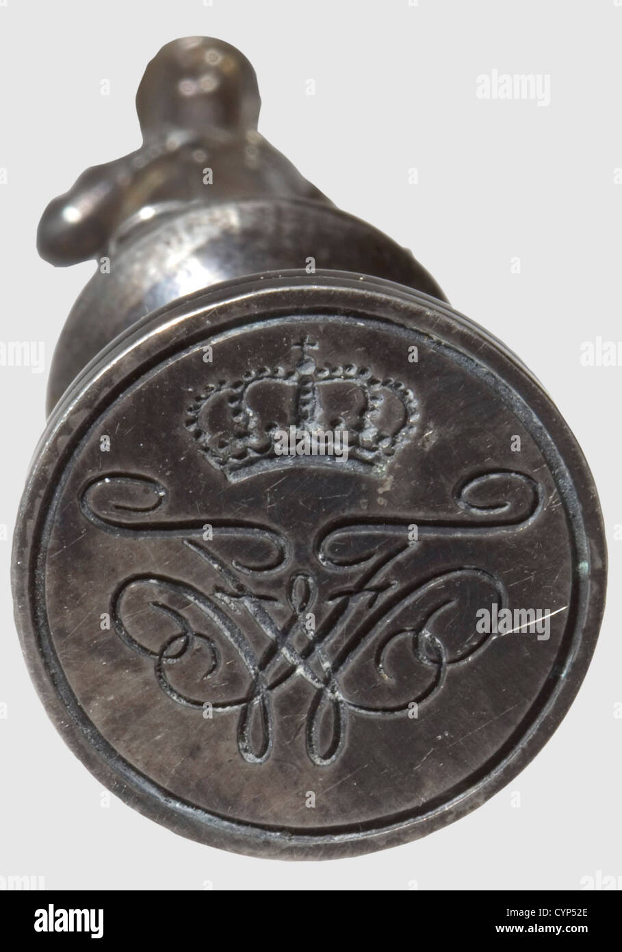King Friedrich Wilhelm III of Prussia(1770 - 1840)- personal silver seal in seal stand,Silver and gilt silver.The seal in the shape of a small statue of the king with overcoat and cap on a base.The seal matrix cut with his typical mirror cipher 'FW' under the royal Prussian crown.Height 6 cm.The seal holder of gilt silver,the seal resting on a small socle in the centre of a cenotaph beneath the royal Prussian crown,flanked by two guard grenadiers.Size ca 12.5 x 8 x 6.5 cm.Provenance: ZAM - Zentrum für Außergewöhnliche Museen,München(Centre for Exce,Additional-Rights-Clearences-Not Available Stock Photo