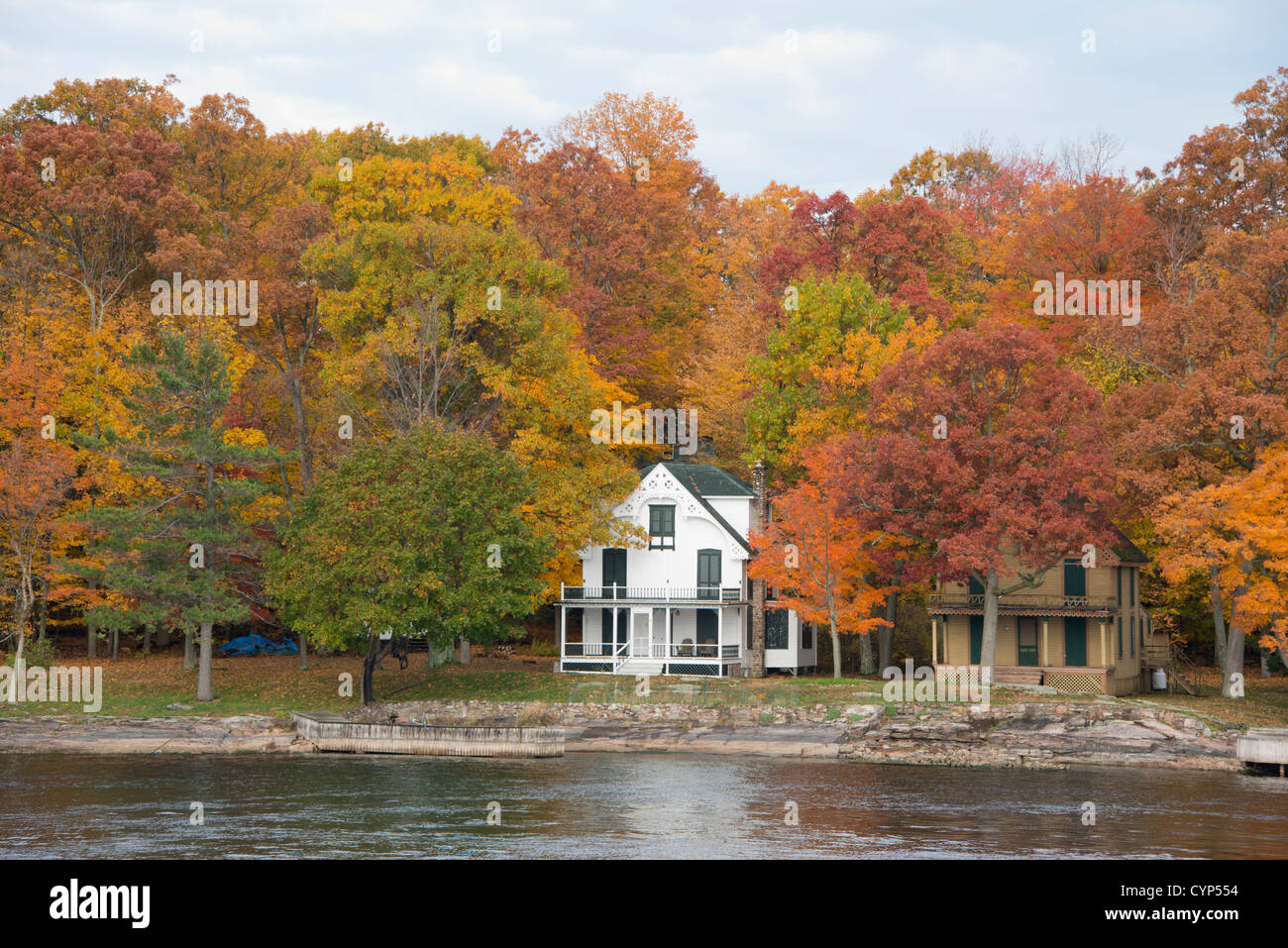 New York, Thousand Islands, St. Lawrence River. Island home in autumn