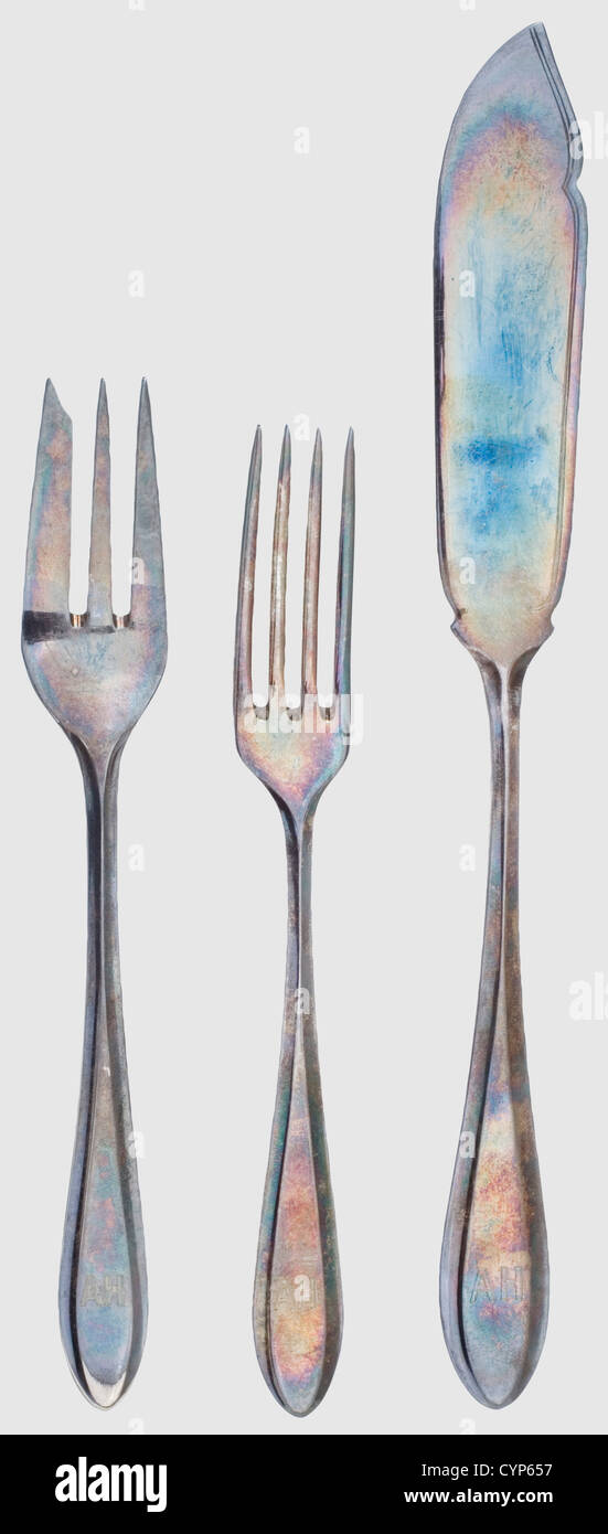 Adolf Hitler - ten pieces of silverware from his Munich residence,Two fish knifes,four pastry as well as four dessert forks in hard silver-plated version of the Krupp Berndorf company with respective manufacturer's stamps and marks '90' for the silver plating(two pieces without marks).Each handle engraved with the initials 'AH'.Length 22,16.5 and 16 cm.Provenance: Found by US Lt.Steven Cernan of the 'G' Company,197th Infantry,45th Division in 1945 in Hitler's bunker beside several other objects from Hitler.With it a copy of his signed certification w,Additional-Rights-Clearences-Not Available Stock Photo