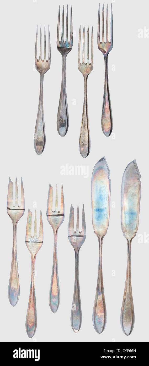 Adolf Hitler - ten pieces of silverware from his Munich residence,Two fish knifes,four pastry as well as four dessert forks in hard silver-plated version of the Krupp Berndorf company with respective manufacturer's stamps and marks '90' for the silver plating(two pieces without marks).Each handle engraved with the initials 'AH'.Length 22,16.5 and 16 cm.Provenance: Found by US Lt.Steven Cernan of the 'G' Company,197th Infantry,45th Division in 1945 in Hitler's bunker beside several other objects from Hitler.With it a copy of his signed certification w,Additional-Rights-Clearences-Not Available Stock Photo