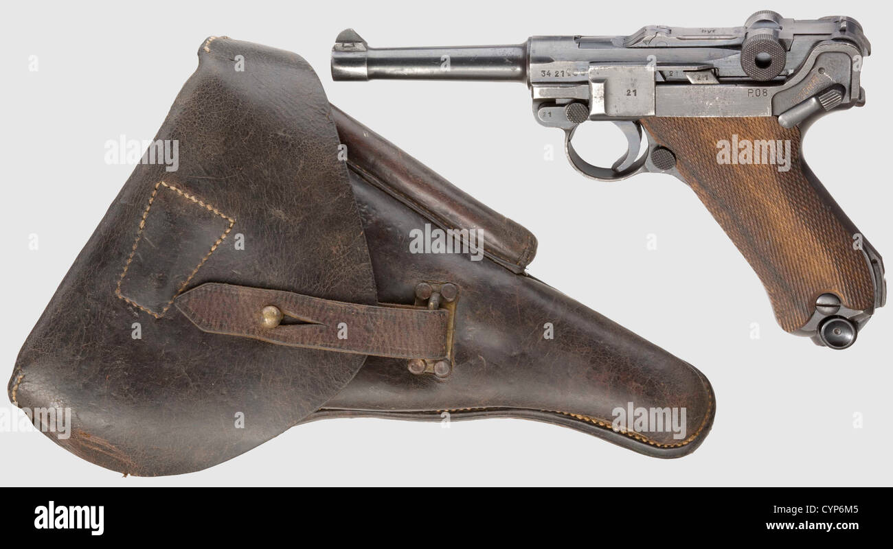 A pistol 08 DWM 1920,Reichswehr,navy,9 mm Parabellum cal,no. 1145b. Matching numbers,firing pin without number,additional and unusual full serial number on right side of fork housing. Matt bore,barrel length 100 mm. Strong connective bolt with large collar as with pistol 04. Slot for shoulder stock. On the short,originally inscriptionless receiver head Reichswehr property mark '1920'. On left side of barrel and fork housing navy proof mark crown,on fork housing double navy acceptance marks crown/'M'. On front of grip vertically marked 'O.62.'(Ostseefl,Additional-Rights-Clearences-Not Available Stock Photo