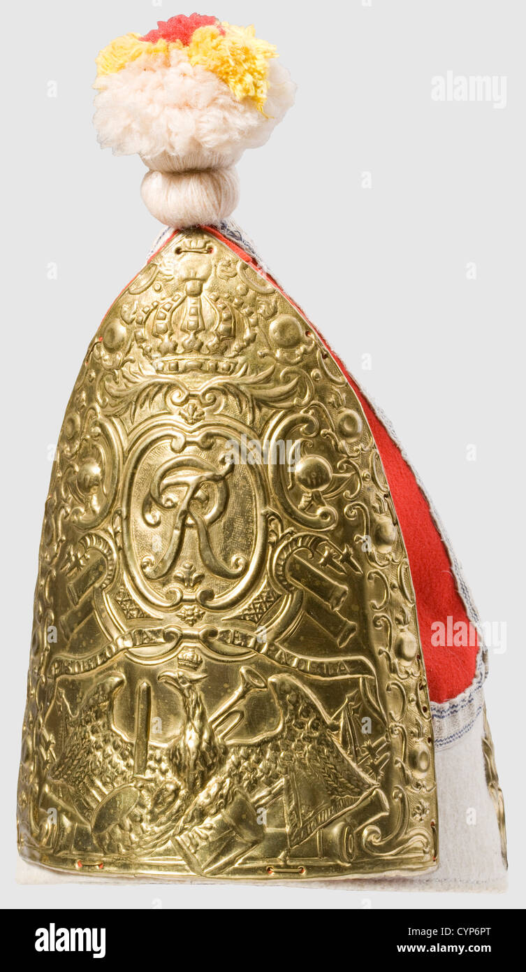 A grenadier's cap,of Infantry Regiment Nr. 25 von Kalckstein. Frontal shield,rear trophy shield and lateral flame appliqués of stamped brass. Cloth sections and leather liner authentically restored,the plate parts likely come from the Kassel theatre properties and thus are old,but not contemporary. The grenadier cap is accompanied by an expertise from Klaus-Peter Merta of the German Historical Museum,which in contradiction to our view identifies the metal parts as contemporary,historic,historical,19th century,Prussian,Prussia,German,Germany,militar,Additional-Rights-Clearences-Not Available Stock Photo