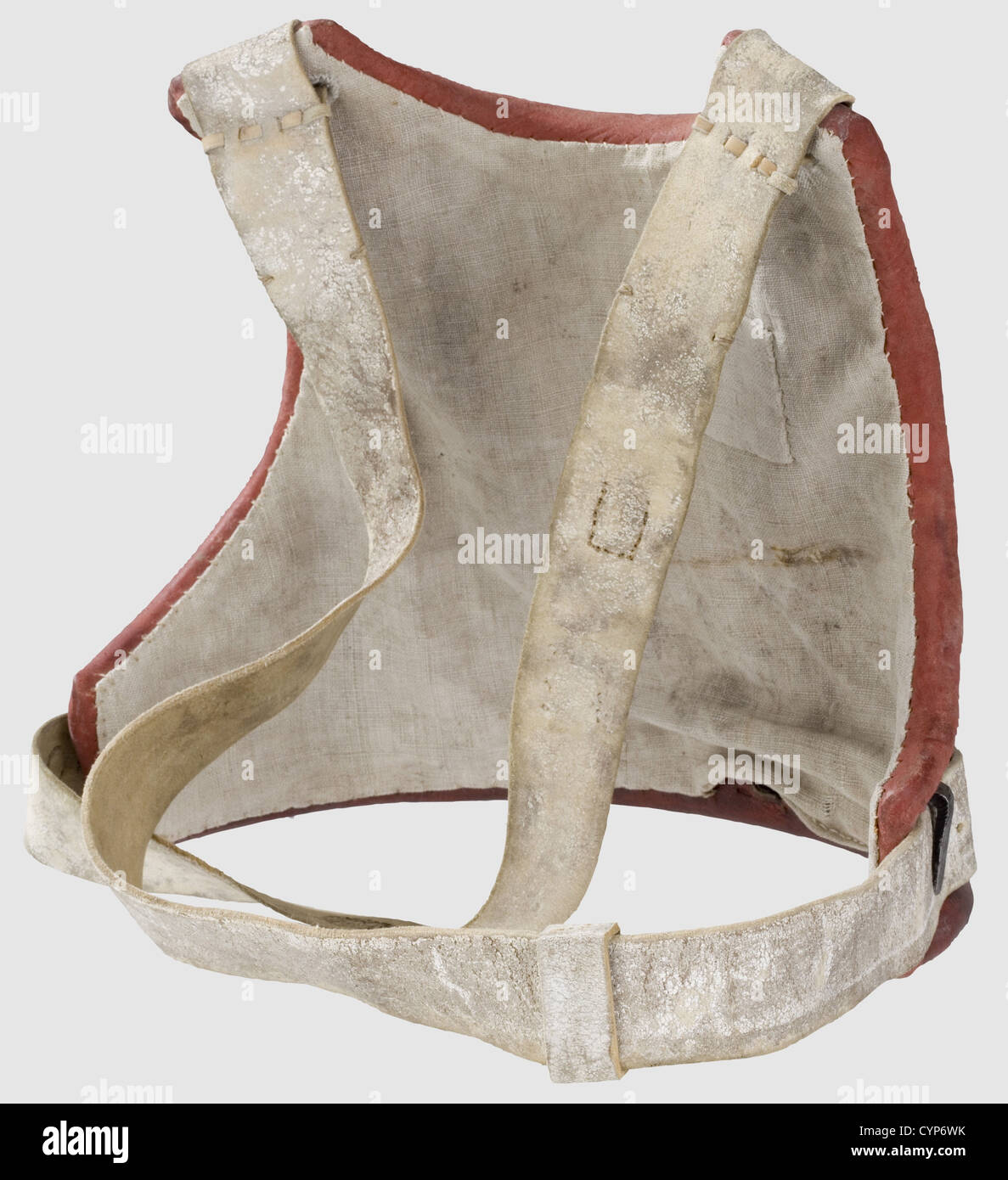 A model 1715 cuirass for enlisted men,Slightly ridged,hammered iron breastplate,lateral iron strap hooks.Only fragments of the original black paint remain.Renewed straps,using old material from the Kassel theatre properties,new red leather border-trim and linen liner,the inside lower edge with Nuremberg maker's marks(shield with 'W.K.& S.1,18').Weight 2,320 g.This cuirass comes from an order of 9,000 pieces commisioned by Frederick William I in 1715,originally with a leather liner.It presumably entered the collection of G.Petschke as part of a 19,Additional-Rights-Clearences-Not Available Stock Photo