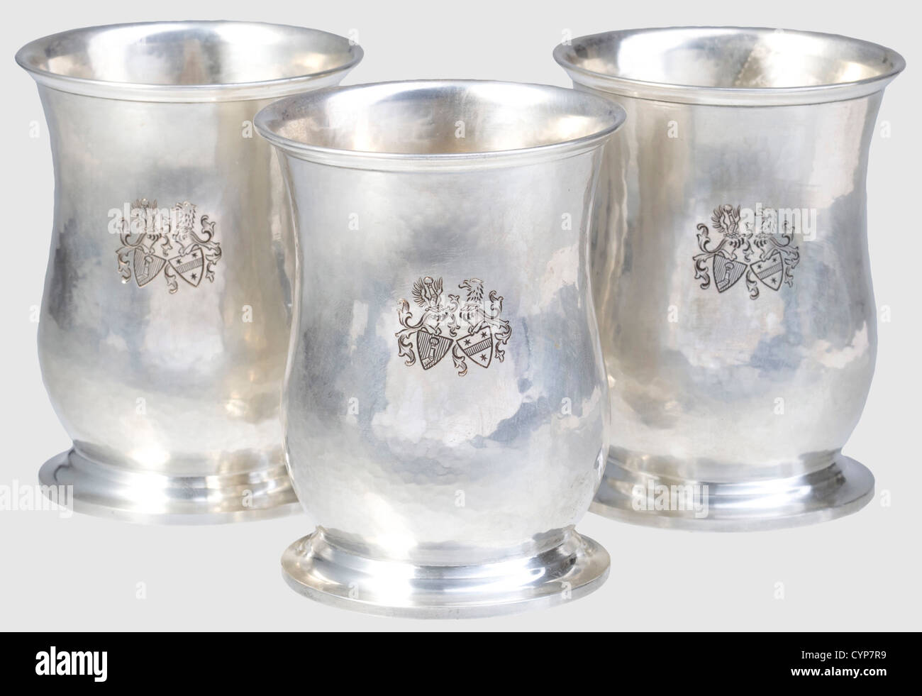 Hermann and Emmy Göring - three silver beakers, Silver, hand-hammered. Slightly bulbous design on a circular base. On the front side engraved alliance coat of arms, on the bottom master's mark as well as hallmark 'Kleemann - 800 - Handarbeit' (handmade). Height 8.8 cm each, weight 92 g each, historic, historical, 1930s, 1930s, 20th century, NS, National Socialism, Nazism, Third Reich, German Reich, Germany, German, National Socialist, Nazi, Nazi period, fascism, vessel, vessels, object, objects, stills, clipping, clippings, cut out, cut-out, cut-outs, Additional-Rights-Clearences-Not Available Stock Photo