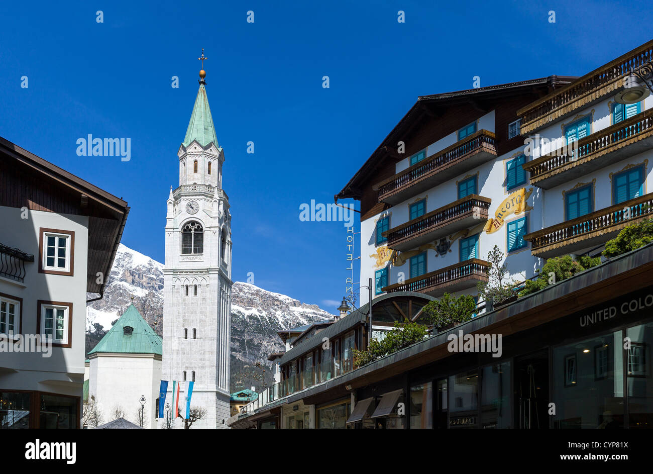 Italy, Dolomites, Veneto, Cortina D'Ampezzo, Corso Italia and the St Filippo and Giacomo parish church Stock Photo