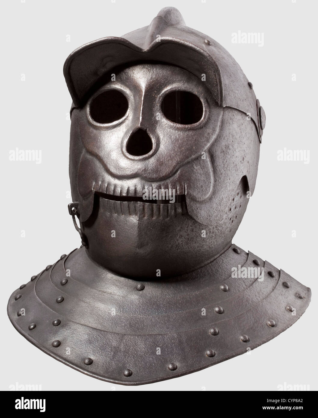 A cuirassier helmet with death's-head visor,This high quality piece was executed for a collector in the style of ca. 1620. The hammered two-piece skull with comb. Riveted notched eye-guard,the mask visor with medial ridge,the perforated bevor with latch hook. Articulated neck and nape ring of four plates. Dark,even patina. Height 34 cm,historic,historical,,17th century,defensive arms,weapons,arms,weapon,arm,fighting device,object,objects,stills,clipping,clippings,cut out,cut-out,cut-outs,utensil,piece of equipment,utensils,plating,armo,Additional-Rights-Clearences-Not Available Stock Photo