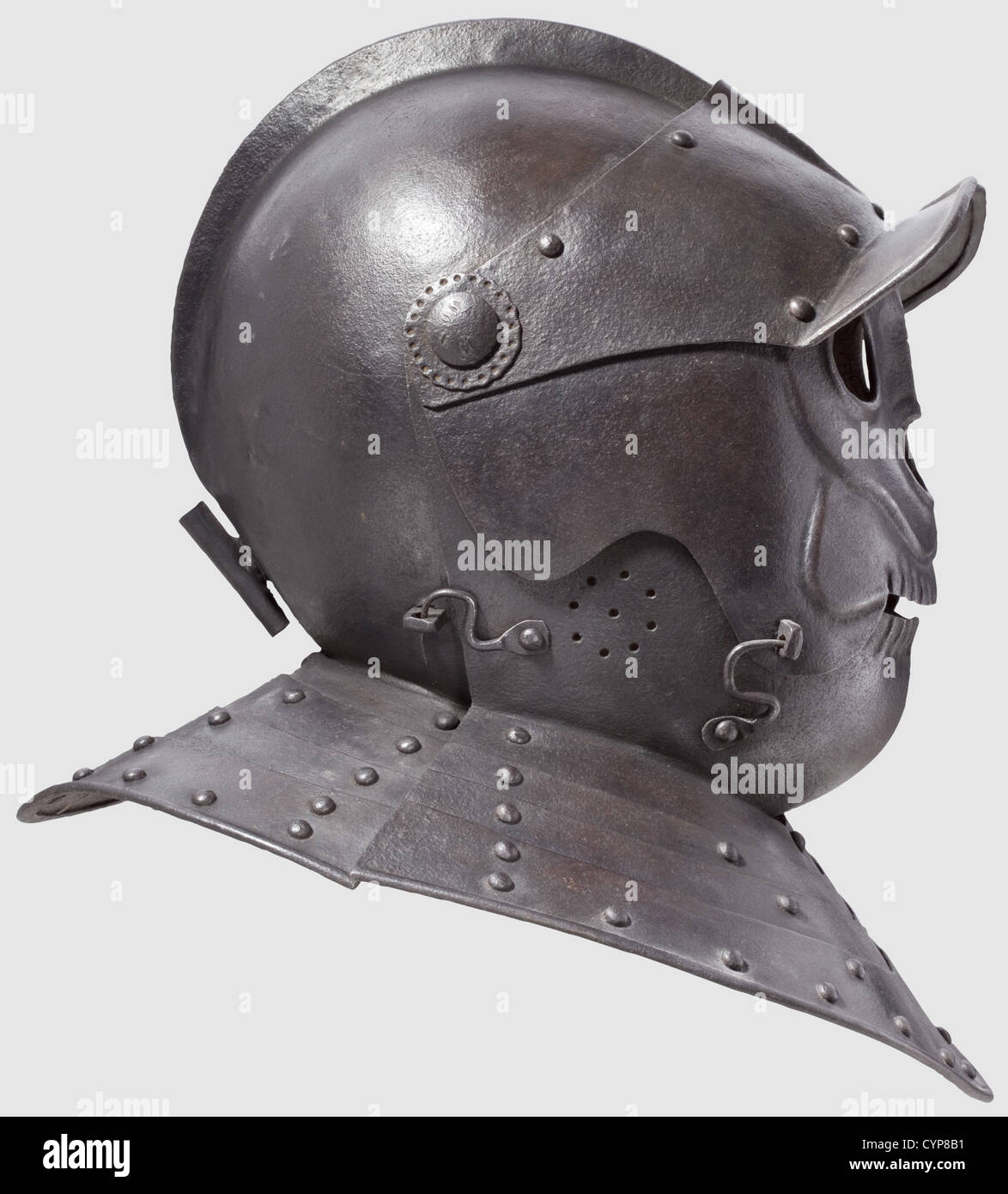 A cuirassier helmet with death's-head visor,This high quality piece was executed for a collector in the style of ca. 1620. The hammered two-piece skull with comb. Riveted notched eye-guard,the mask visor with medial ridge,the perforated bevor with latch hook. Articulated neck and nape ring of four plates. Dark,even patina. Height 34 cm,historic,historical,,17th century,defensive arms,weapons,arms,weapon,arm,fighting device,object,objects,stills,clipping,clippings,cut out,cut-out,cut-outs,utensil,piece of equipment,utensils,plating,armo,Additional-Rights-Clearences-Not Available Stock Photo
