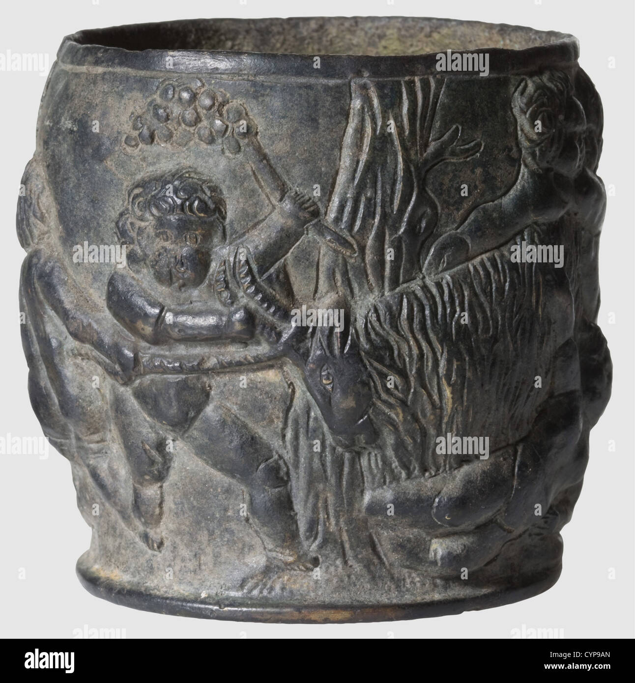 A Roman cup with relief decoration, 1st/2nd century A.D. Bronze with