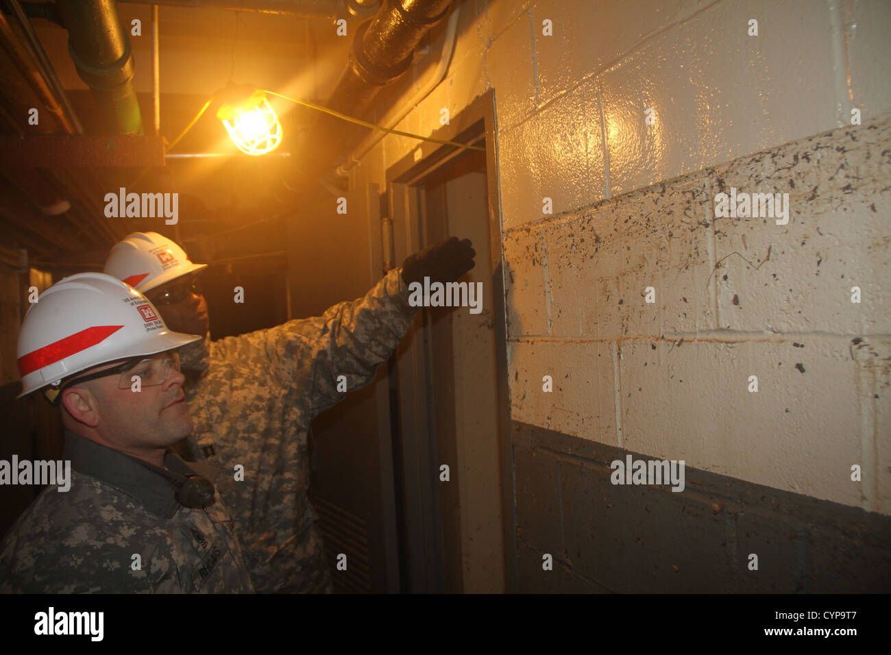 BROOKLYN, New York Soldiers from the 249th EN BN (Prime Power) assess damages to 18 buildings in the Red Hook Housing complex to Stock Photo