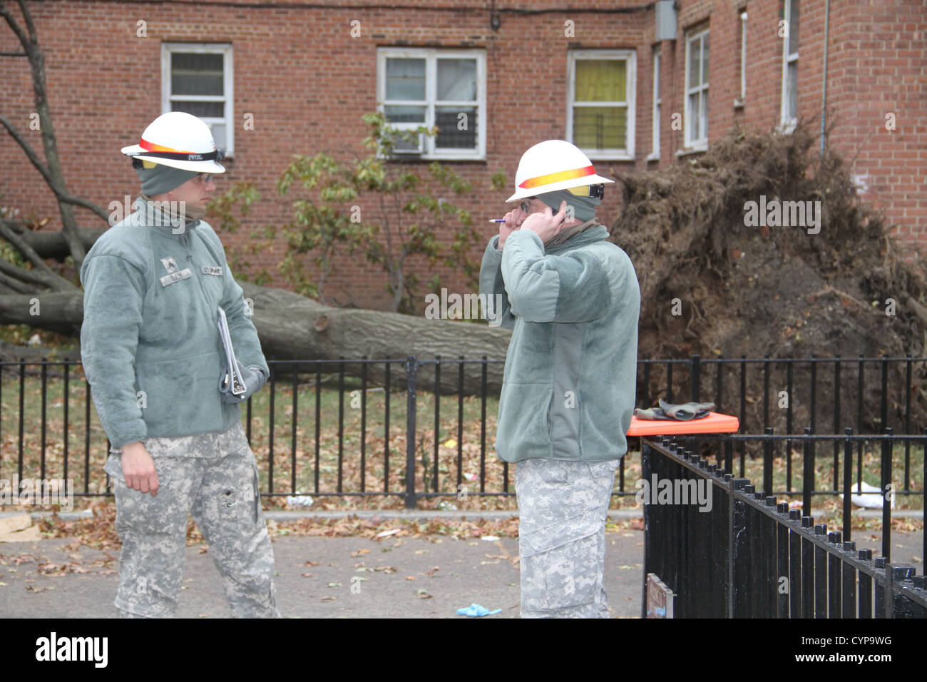 BROOKLYN, New York Soldiers from the 249th EN BN (Prime Power) assess damages to 18 buildings in the Red Hook Housing complex to Stock Photo