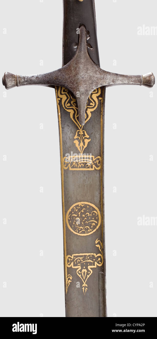 An Ottoman gold-inlaid kilij,circa 1800.Beautifully grained Wootz-damascus blade with a broadened double-edged point.The back cut and also inlaid in gold.Both sides display gold-inlaid cartouches with inscription in Arabic 'In the name of God,the merciful,the compassionate',followed by sura 11,'I put my trust in God' and 'Grown enemies are the measurement for suffering',below that 'God,give measure and benevolence to the heart'.Iron cross-piece with grip scales of dark horn.Original wooden scabbard covered with shagreen leather,stiched with wire.I,Additional-Rights-Clearences-Not Available Stock Photo