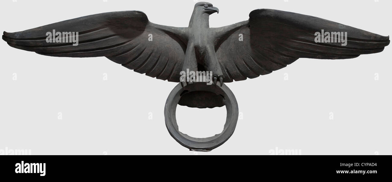 Josef Weisz(1894 - ?)- a national eagle,with extended wings,bronze,hollow,dimensions 240 x 95 cm. The swastika is sawn out of the crest,the fixation base is missing. A bullet hole of a small-calibre arm in the left wing. This eagle was mounted to a pylon of the Adolf-Hitler-Brücke,later Hohe-Flut-Brücke or Berliner-Brücke,in Kulmbach. The bridge structure was inaugurated on October 15th 1934 in the presence of Gauleiter Hans Schemm. The swastika has been removed from the eagle's crest in 1945,and later the pylon was put down. Josef Weisz was a pupil o,Additional-Rights-Clearences-Not Available Stock Photo