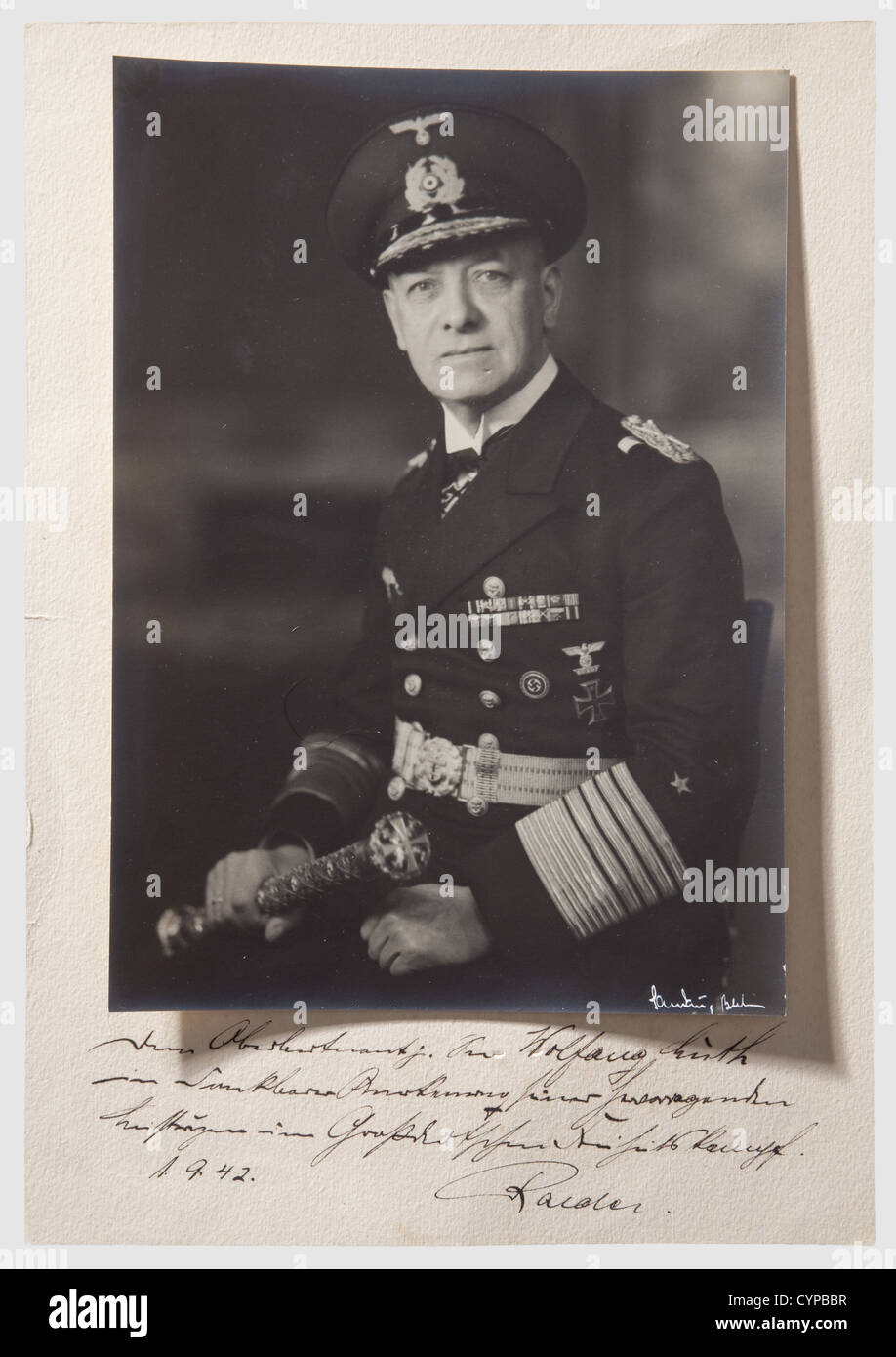 Grand Admiral Erich Raeder, An official photograph dedicated to U-boat Captain, Wolfgang Lüth The Kriegsmarine Commander in Chief in uniform with his Grand Admiral's baton, and wearing the Knight's Cross. The photographer's signature, "Sandau, Berlin," at the lowe people, 1930s, 20th century, navy, naval forces, military, militaria, branch of service, branches of service, armed forces, armed service, object, objects, stills, clipping, clippings, cut out, cut-out, cut-outs, man, men, male, Stock Photo