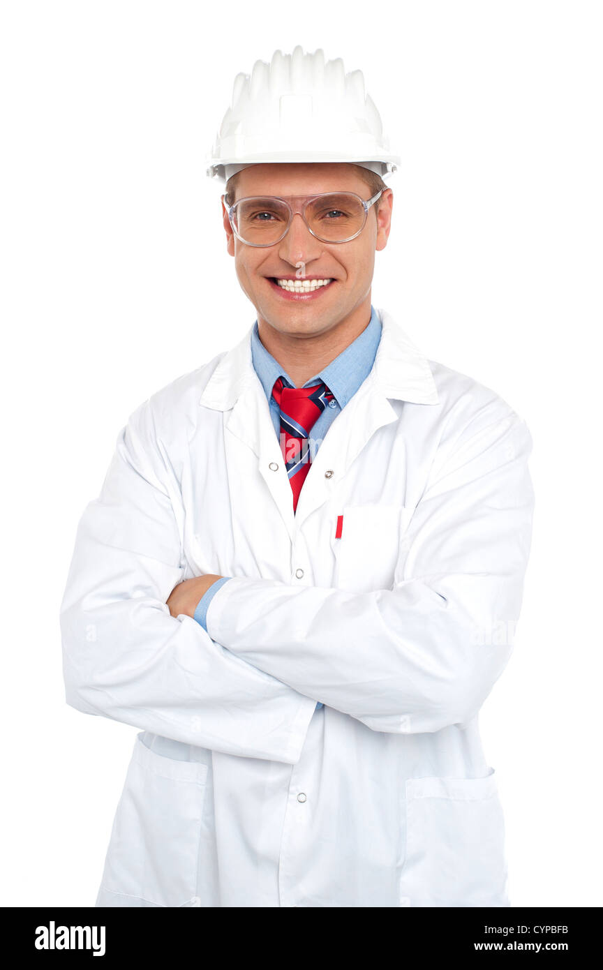 Male architect wearing safety glasses and hard hat. Dressed in white ...