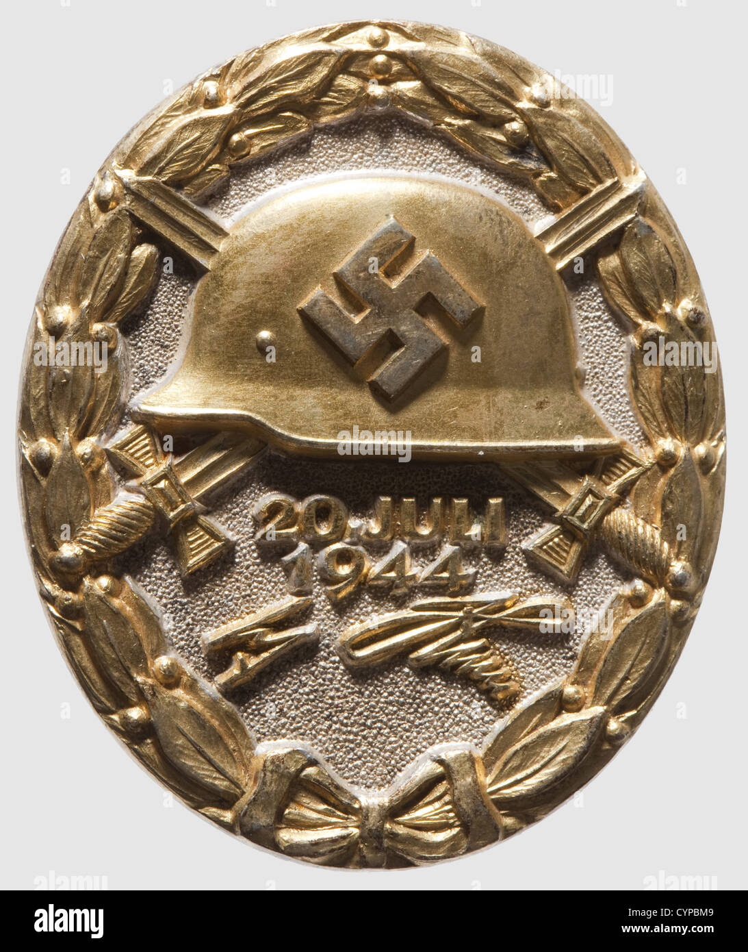 A Wound Badge "20 July 1944" in Gold,in its original case of issue Silver,partially gilded. Marked "800" and "2" for Juncker,Berlin,on the reverse side. The gilding slightly worn off,small scratches on the back(from assaying?),otherwise in outstanding condition. Dimensions 44.24 x 37.08 mm. Weight 35.65 grams(Nie 7.04.16 a1). In its original case of issue with black velvet and white silk lining. Extremely rare. Only 23 or 24 have been awarded in the three levels,gold,silver,and black. The gold level has presumably been awarded four times posthumously,Additional-Rights-Clearences-Not Available Stock Photo
