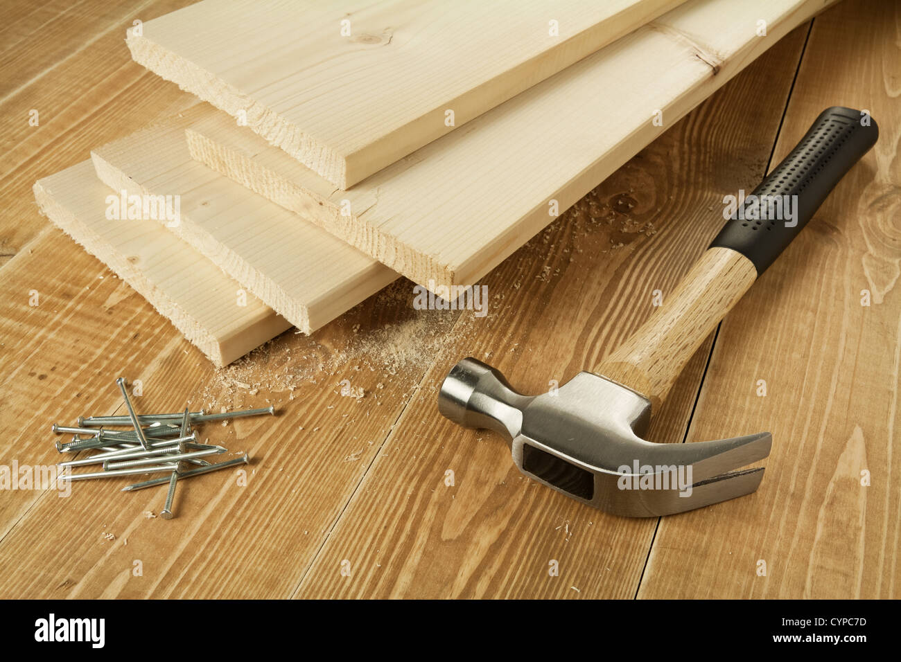 Wooden planks, hammer and nails Stock Photo - Alamy