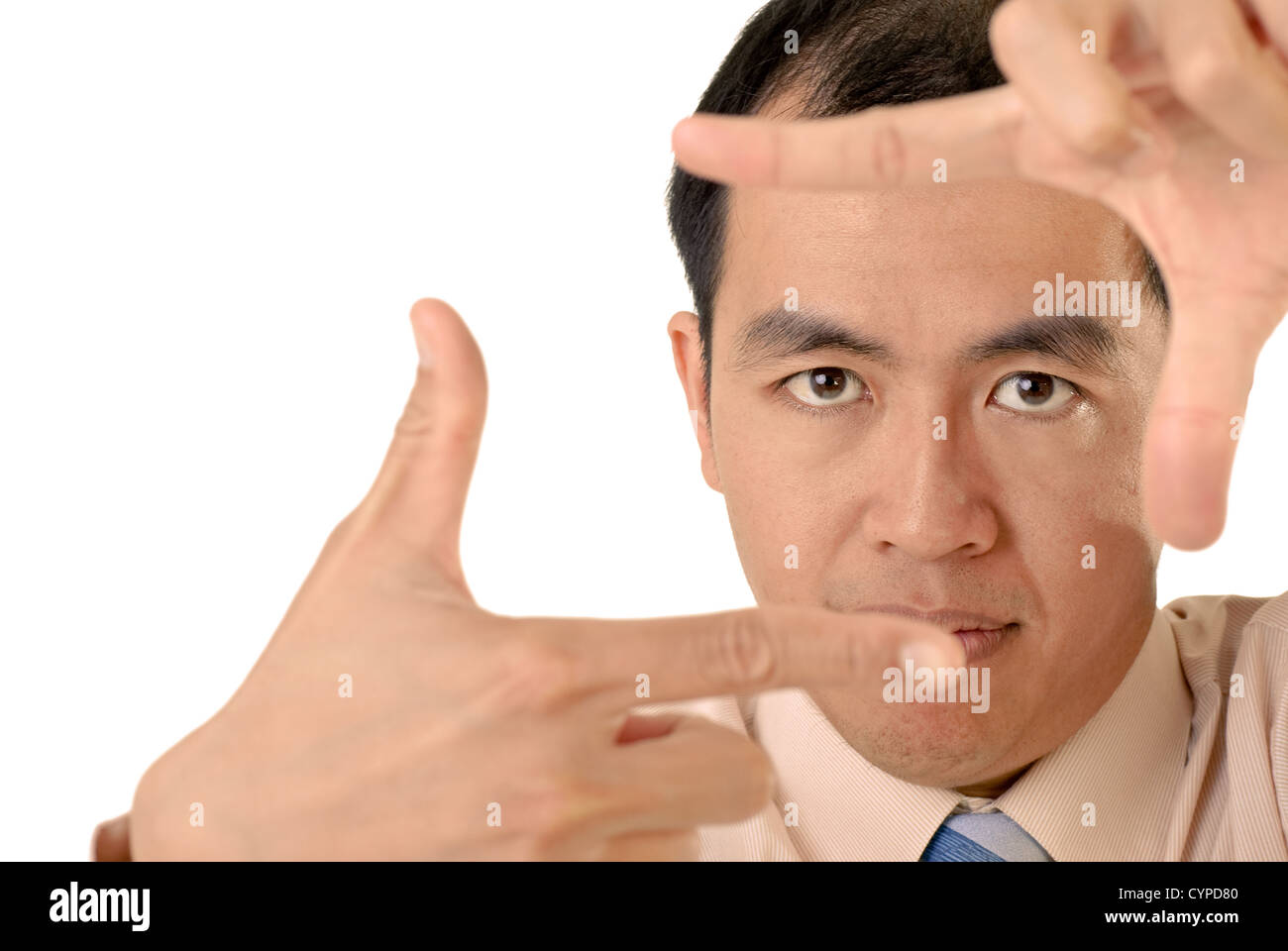 Businessman in focus by hands with confident expression on white ...