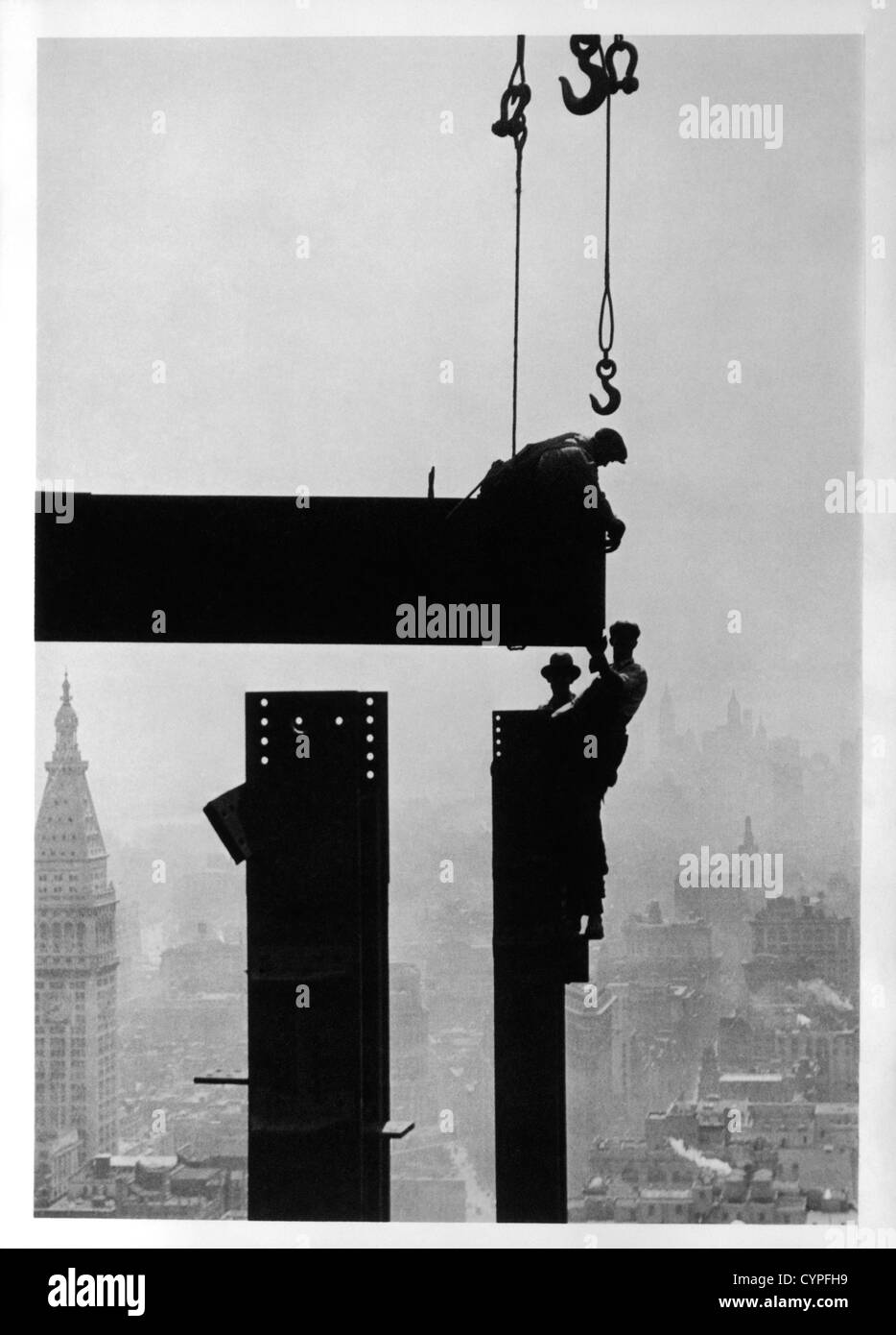 Construction Workers and the Empire State Building, New York City, USA, Circa 1930 Stock Photo