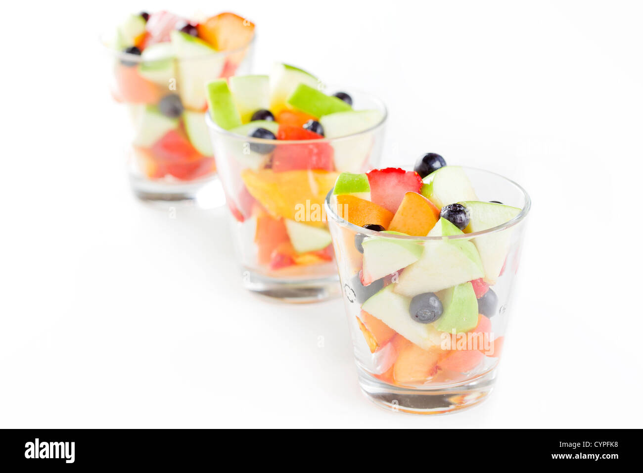 Close up photograph of three glasses of fresh fruit salad Stock Photo