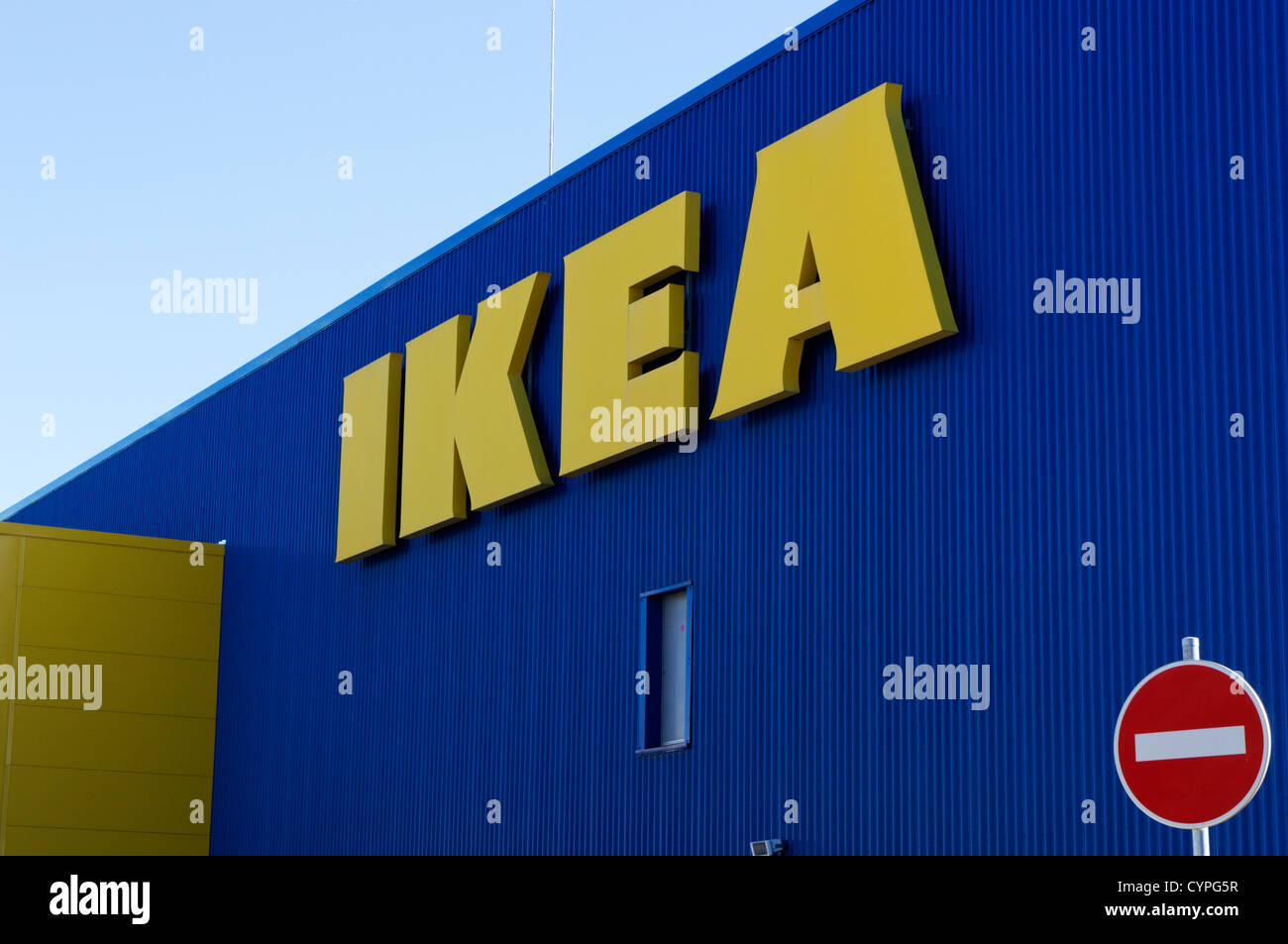 The IKEA name on the side of a large furniture warehouse Stock Photo
