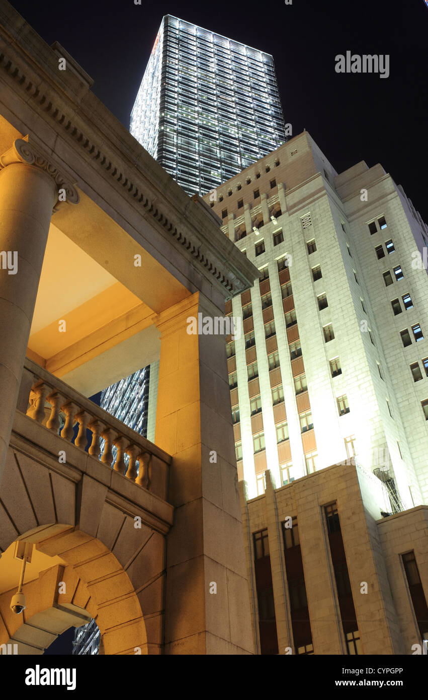 Hong Kong At Night with old and new buildings Stock Photo - Alamy