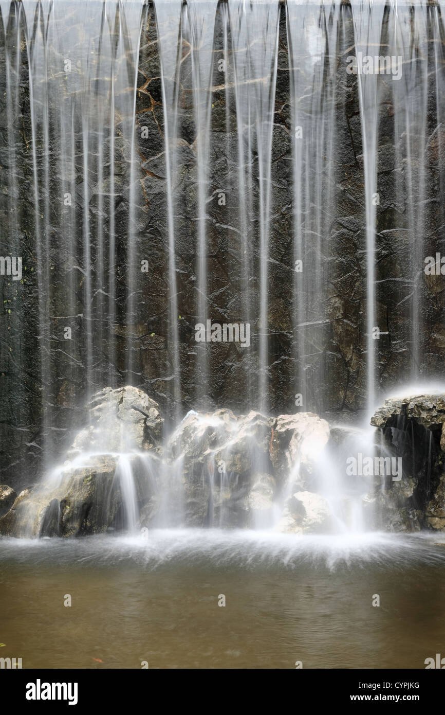Artificial waterfall background Stock Photo