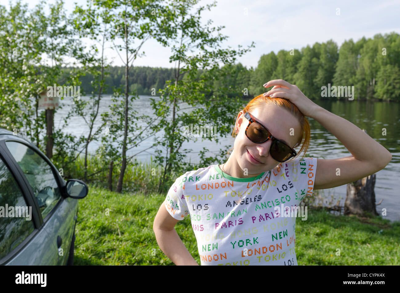 [red haired] Kasimov sunglasses adult girl slim Stock Photo