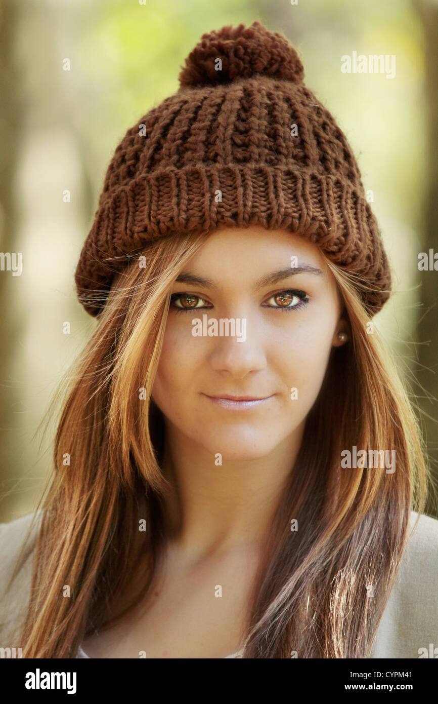 Happy young teenager wearing a winter hat Stock Photo Alamy