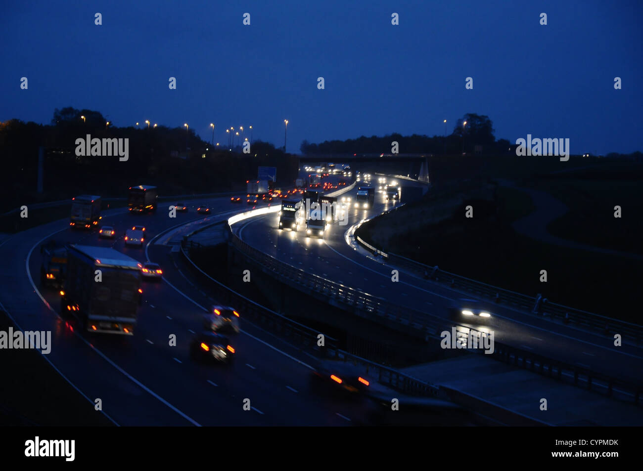 Lorries on motorway at night uk hi-res stock photography and images - Alamy