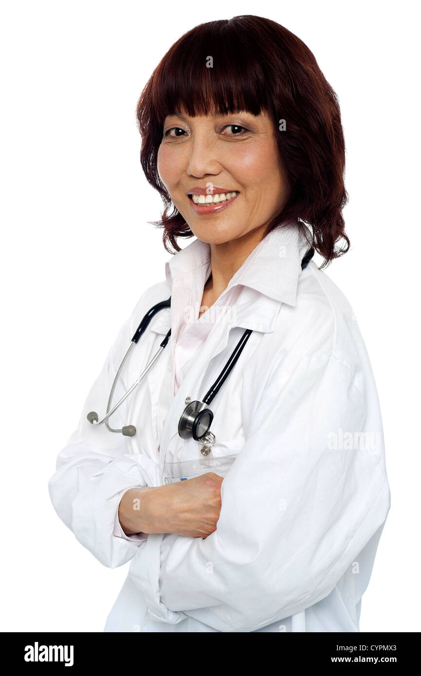 Smiling medical expert posing with arms crossed. Stethoscope around her