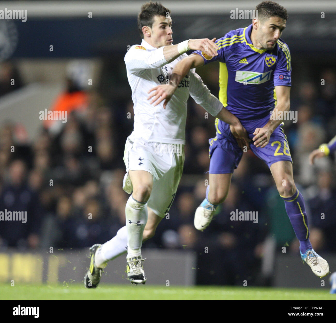 08.11.2012. North London, England.   Gareth Bale of Tottenham Hotspur and Mitja Viler of NK Maribor in action during the Europa League Group J match between Tottenham Hotspur and NK Maribor from White Hart Lane, London Stock Photo