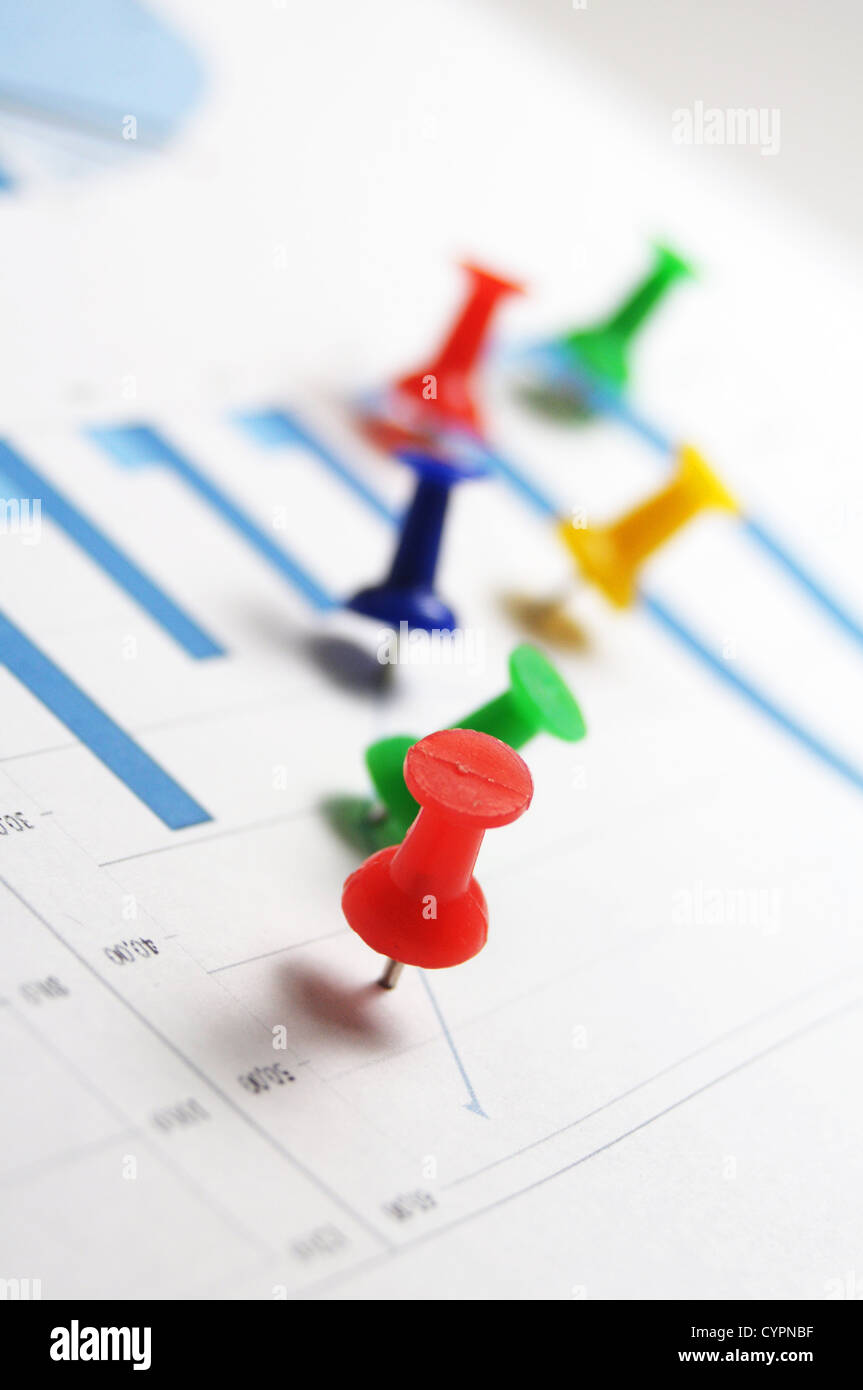 pin and business chart showing financial growth Stock Photo Alamy