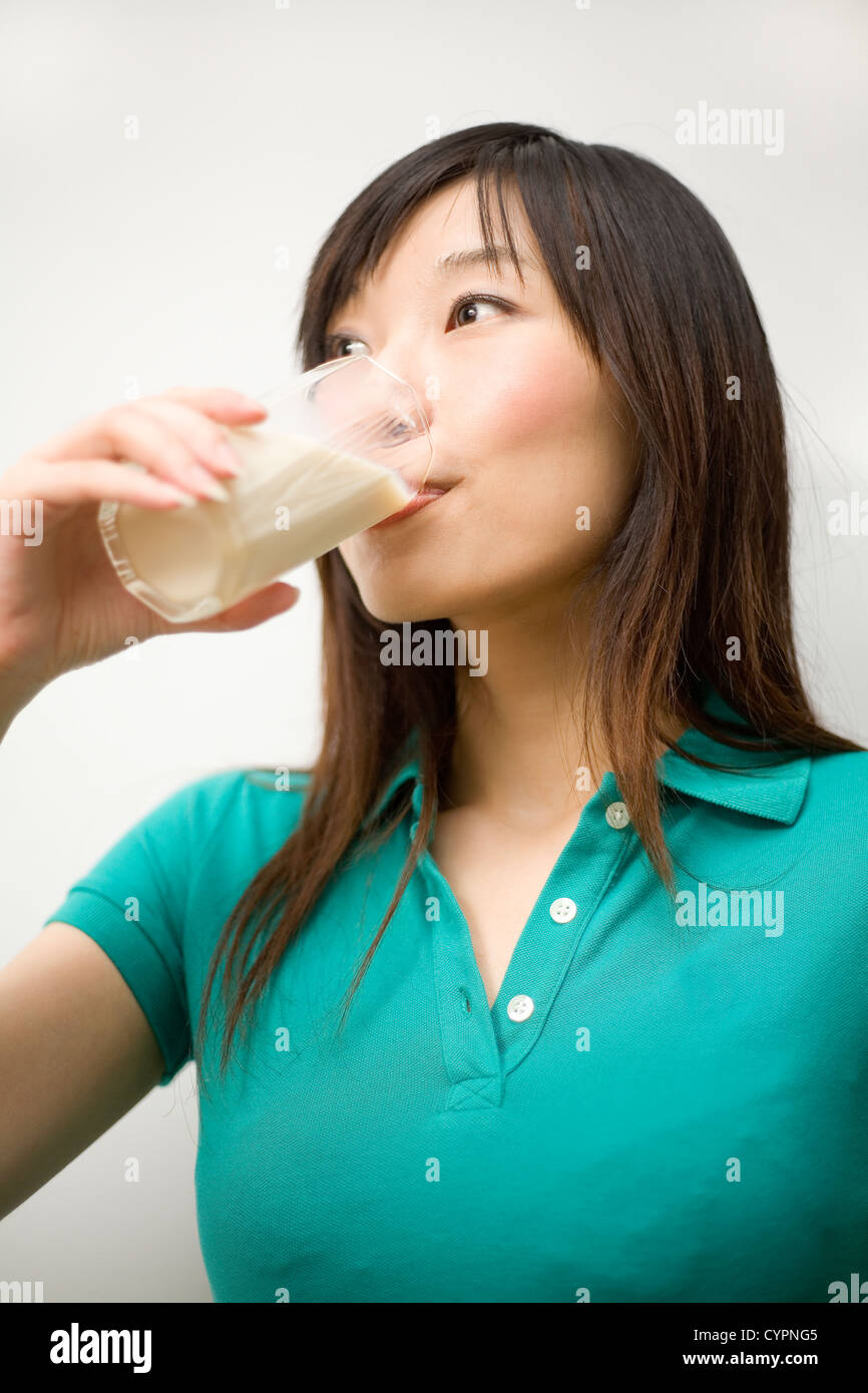 A asian girl drink soybean milk Stock Photo Alamy