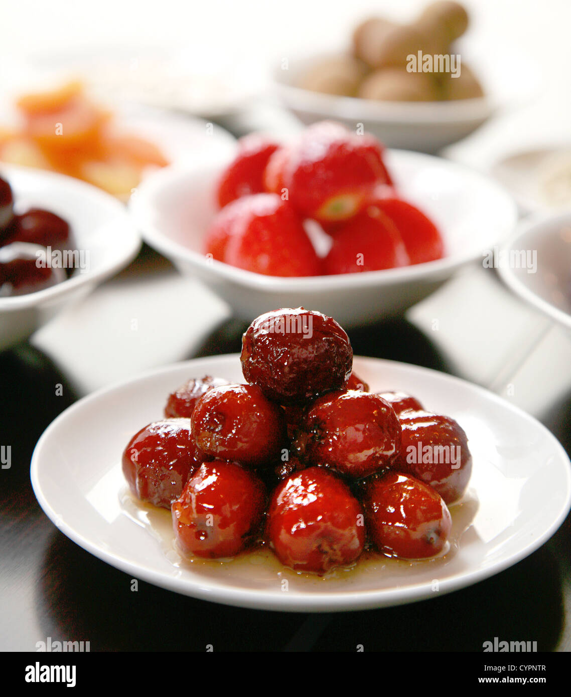 Preserved fruit, plum in the dish Stock Photo - Alamy