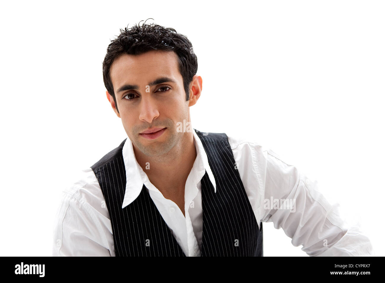 Handsome male wearing a white shirt and black pinstripe vest, isolated Stock Photo