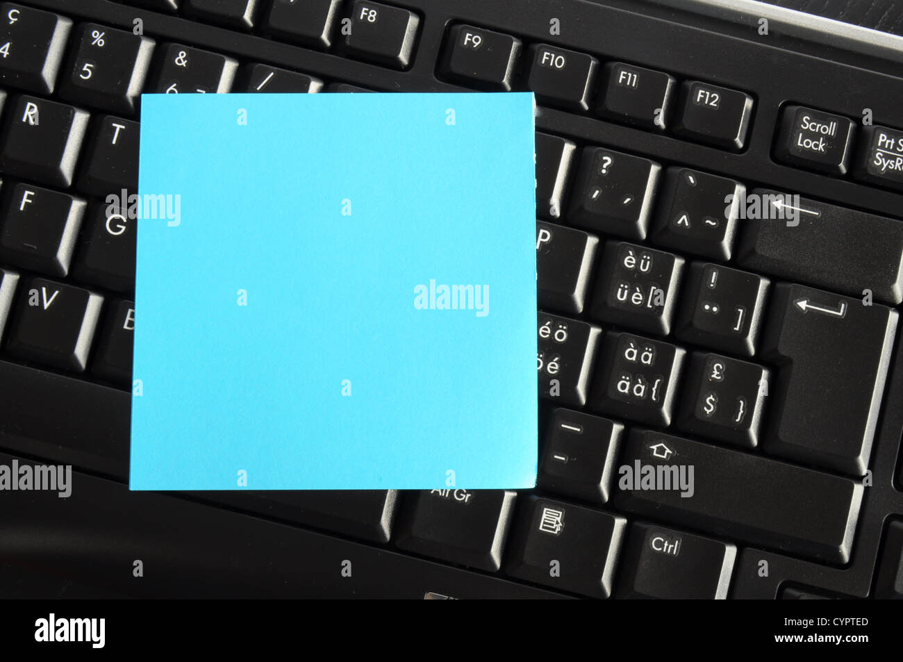 blank or empty sheet of note paper on keyboard Stock Photo - Alamy