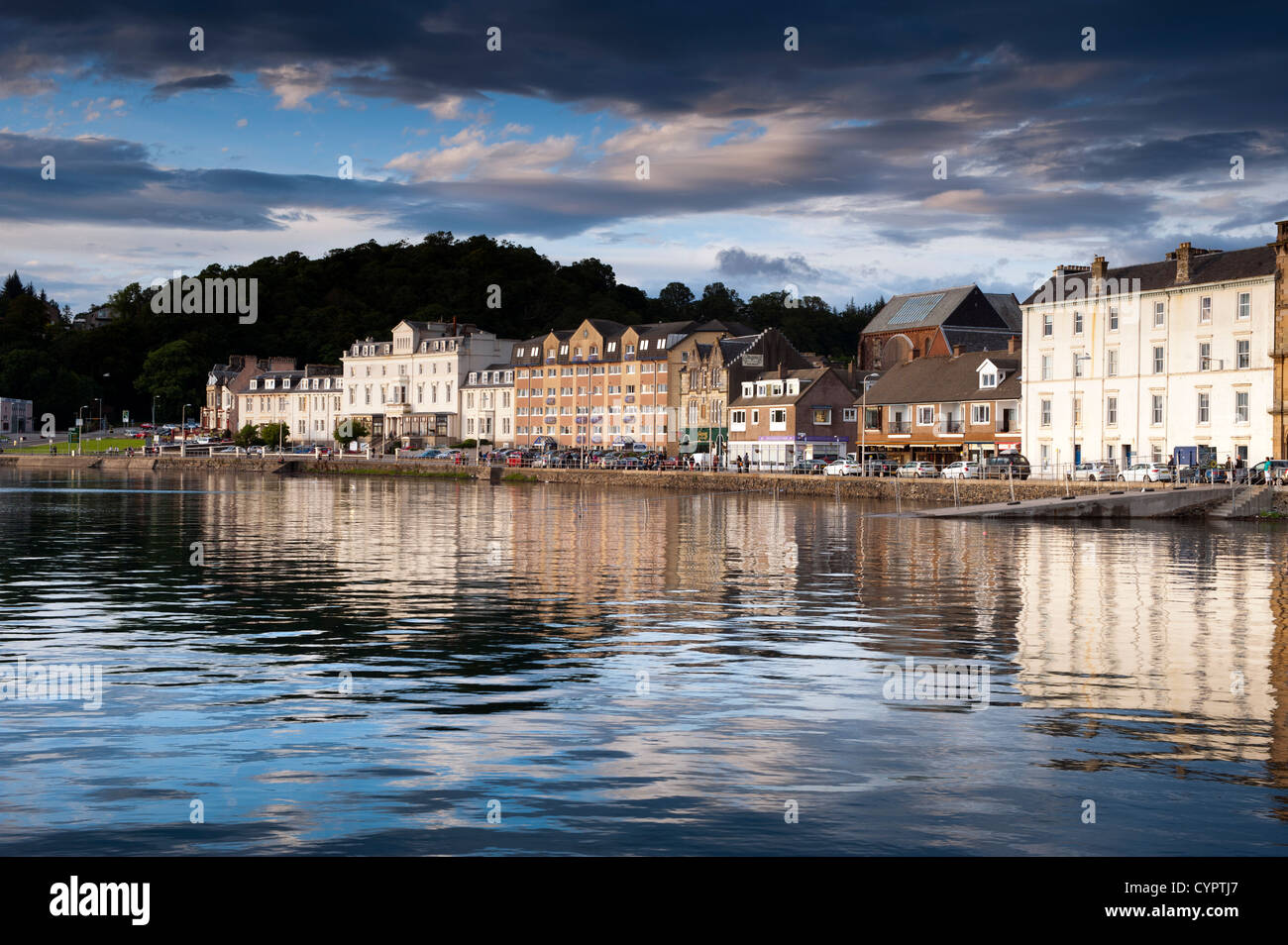 Reflections of harbour front in evening sun, Oban, Scotland. Stock Photo