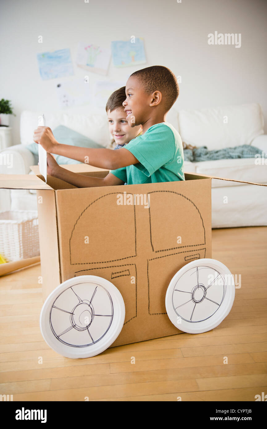 Cardboard car boy hi-res stock photography and images - Alamy, image size:865x1390
