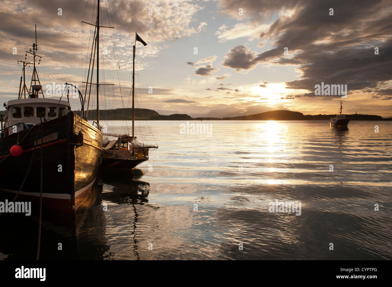 Sailboat in Oban Harbour on a summers evening. UK Stock Photo