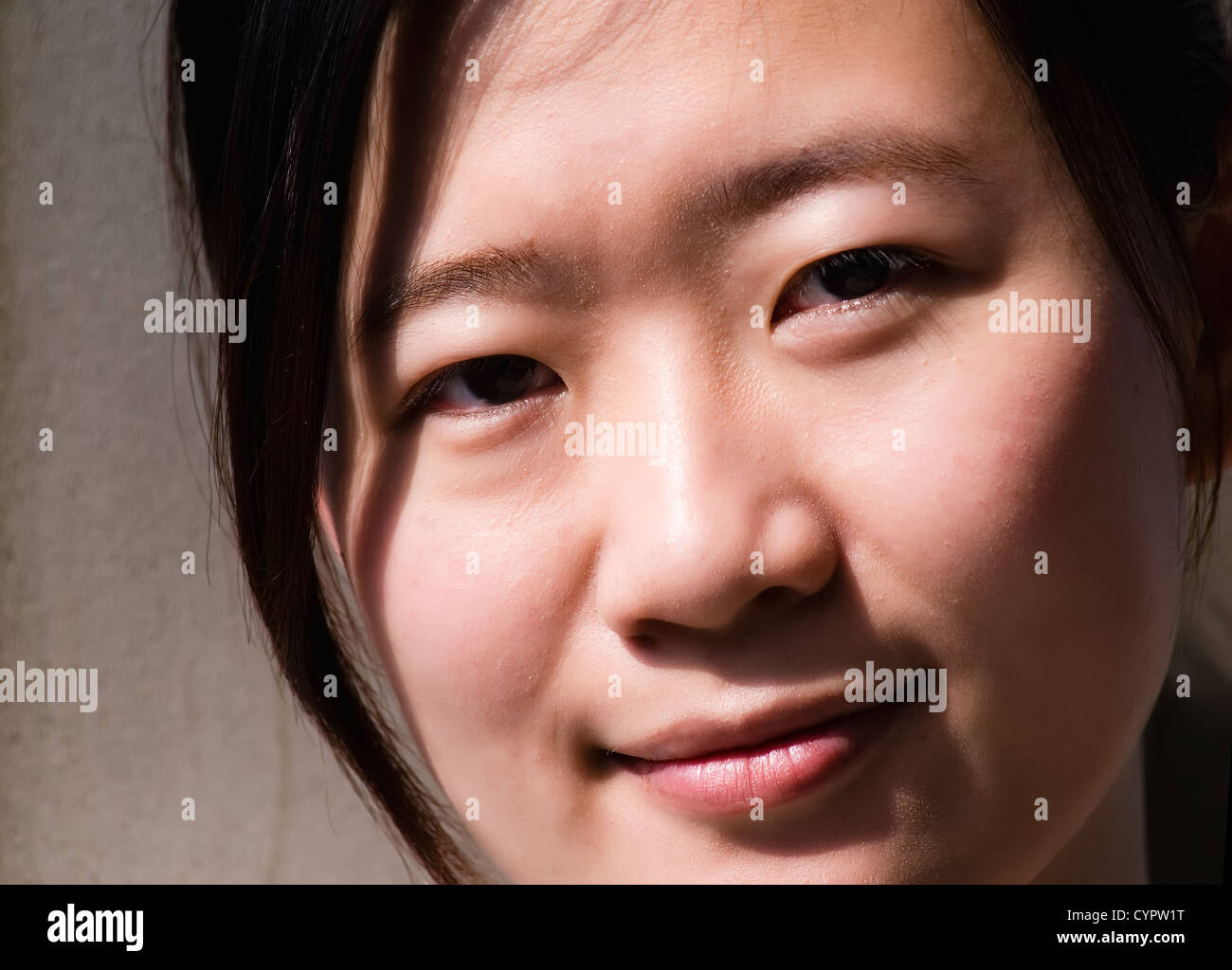 Asians are the characteristics of black hair and yellow skin Stock