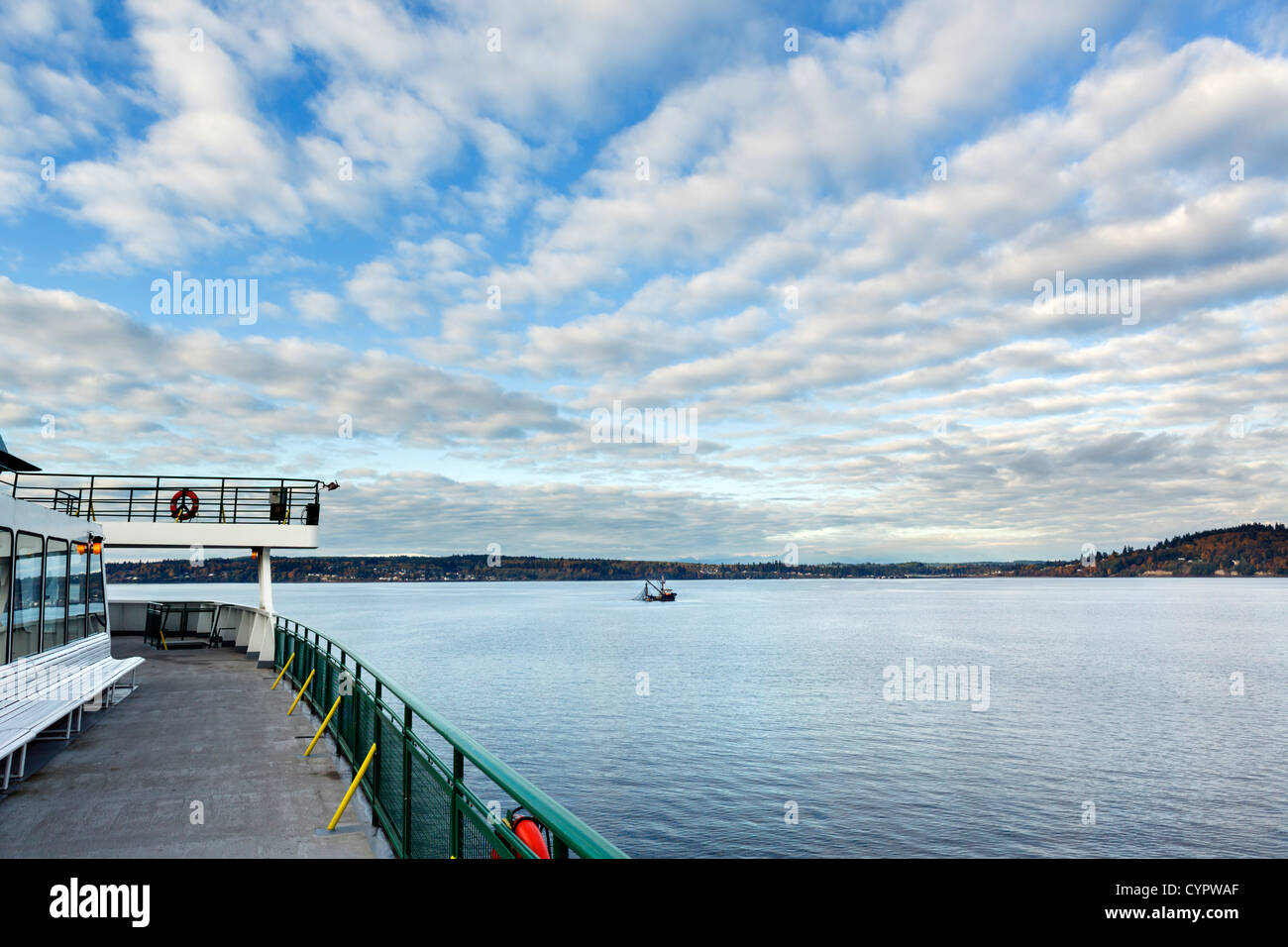 Fishing boat off Olympic Peninsula viewed from Washington State Ferry