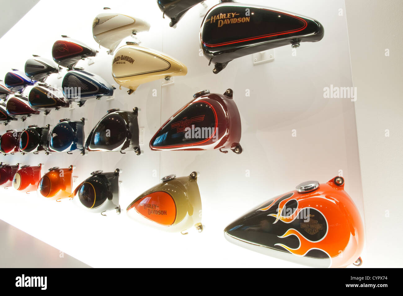 Wall of custom motorcycle gas tanks Harley Davidson Museum Milwaukee, Wisconsin. Stock Photo