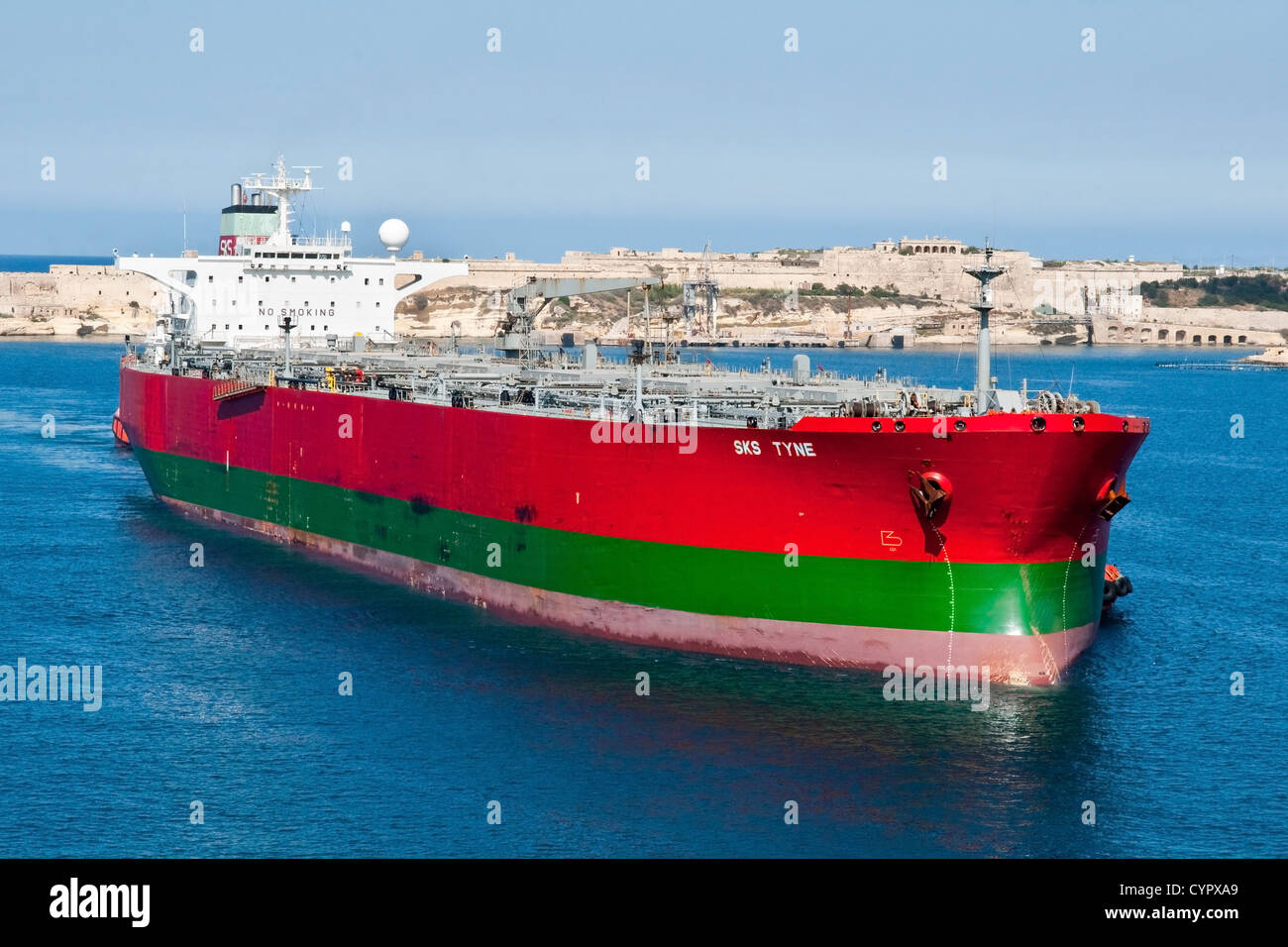 The supertanker 'SK Tyne' entering Grand Harbour, Malta. Stock Photo