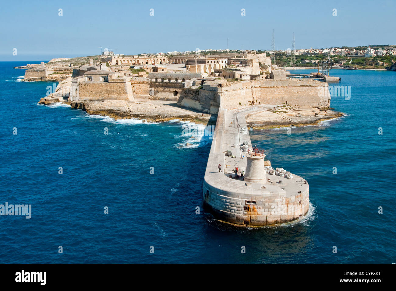 Ricasoli Breakwater with Fort Ricasoli behind forms the eastern arm of Grand Harbour, Malta Stock Photo
