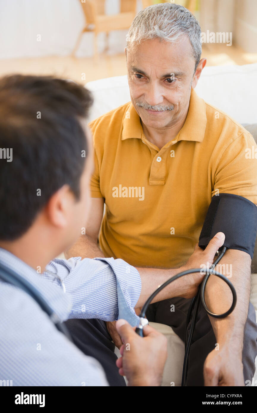 Blood pressure hispanic hi-res stock photography and images - Alamy
