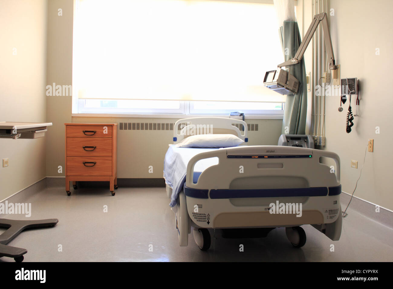 A vacant hospital bed in a hospital room in a hospital Stock Photo